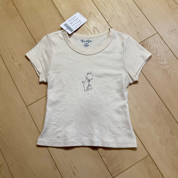 Brandy Melville Tops - brandy melville john galt baby cream colour tshirt BNWT